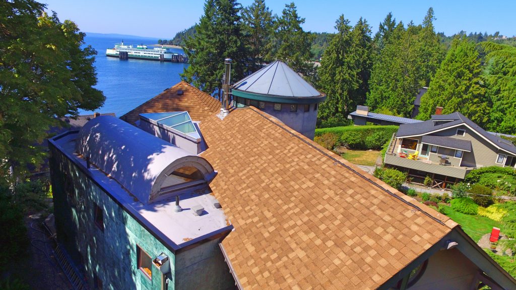 Seattle Roofers Project: The Fauntleroy Roof in Seattle included a TPO membrane and CertainTeed Landmark PRO shingles.