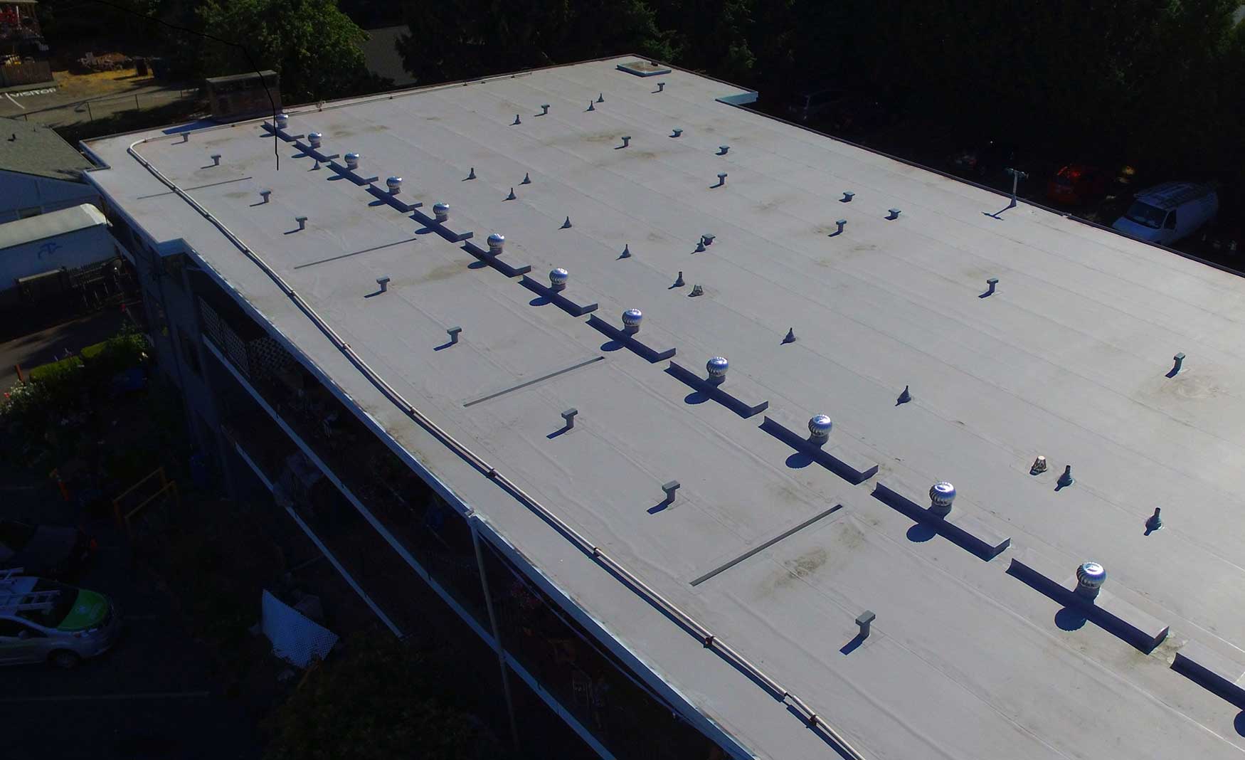 Ambaum Apartments: TPO Roof With Custom Edge Flashings