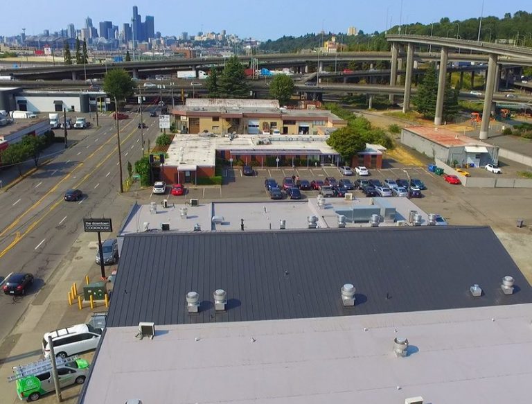 Commercial Roofing: Seattle Cook House metal roof in Matte Black