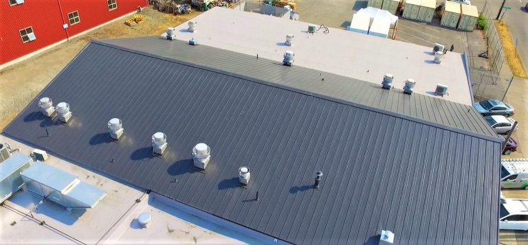 Seattle Cook House Metal & Flat Roof with a Nu-Ray NRM-5000 standing seam metal roof