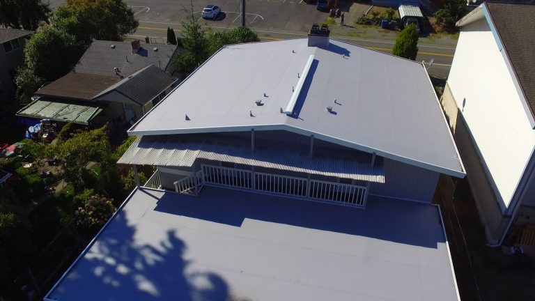 Commercial Flat TPO Roof on West Seattle Apartment Building - Close up aerial view