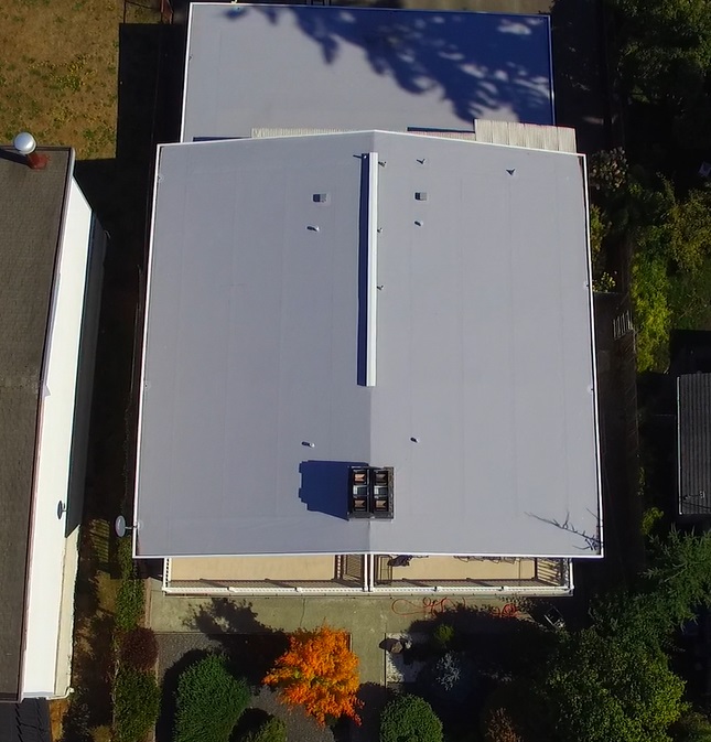 Commercial Flat TPO Roof on West Seattle Apartment Building - Drone view from above the roof