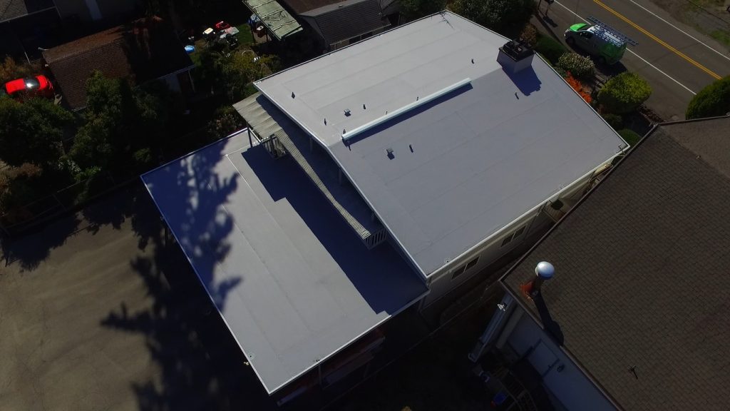 Commercial Flat TPO Roof on West Seattle Apartment Building - Drone View