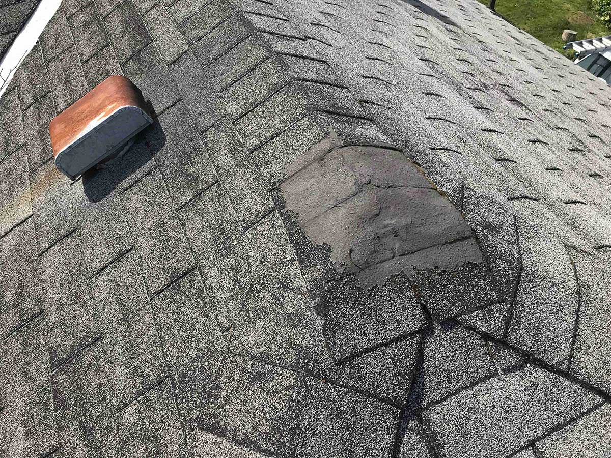 Home with damaged roof