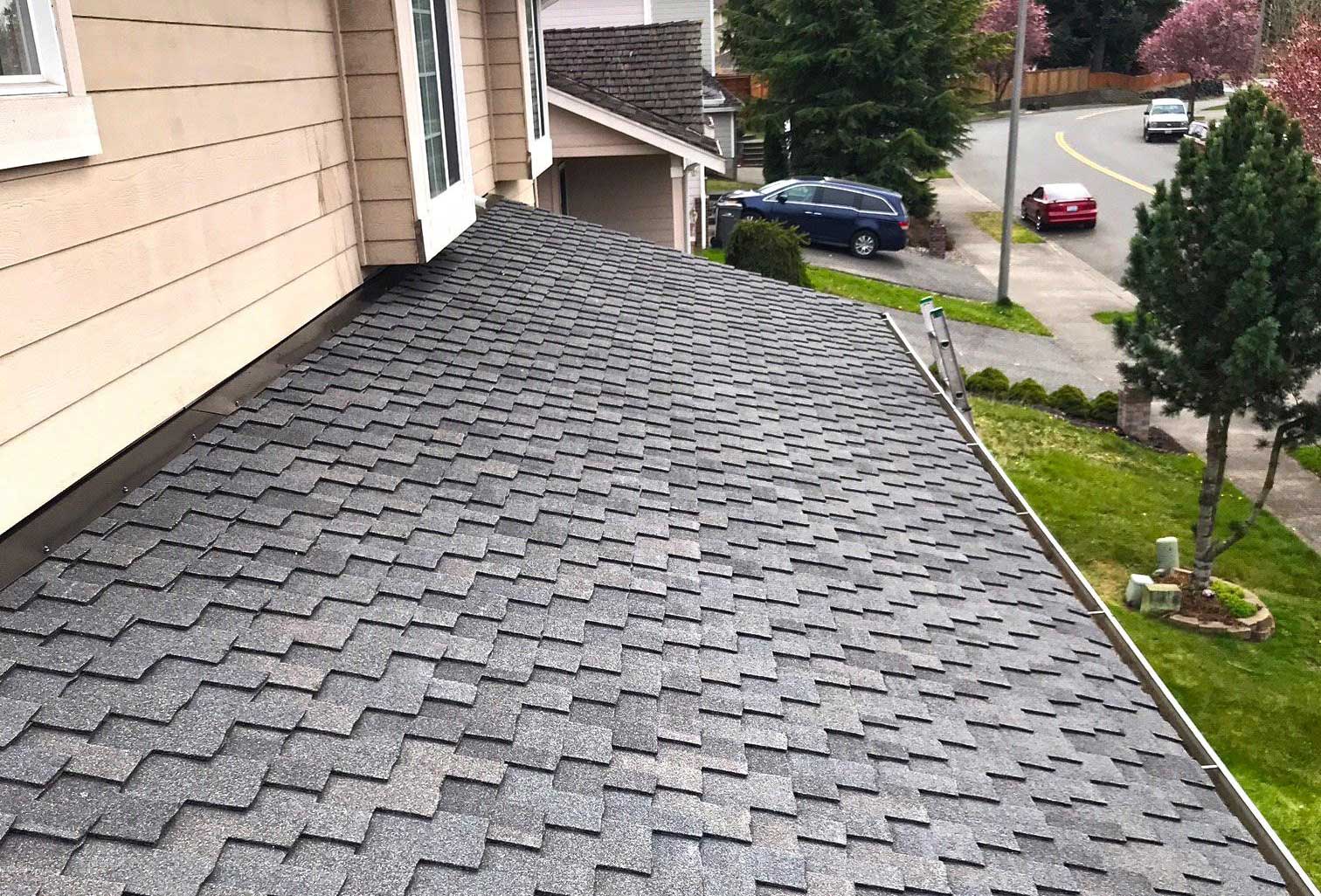 Home with clean Composite roof with good shingle roof maintenance