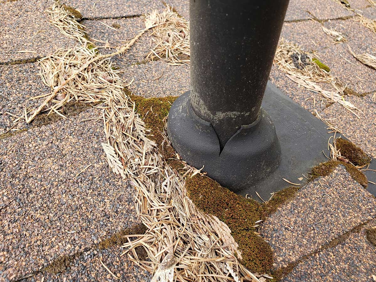 Home with damaged pipe boot on roof