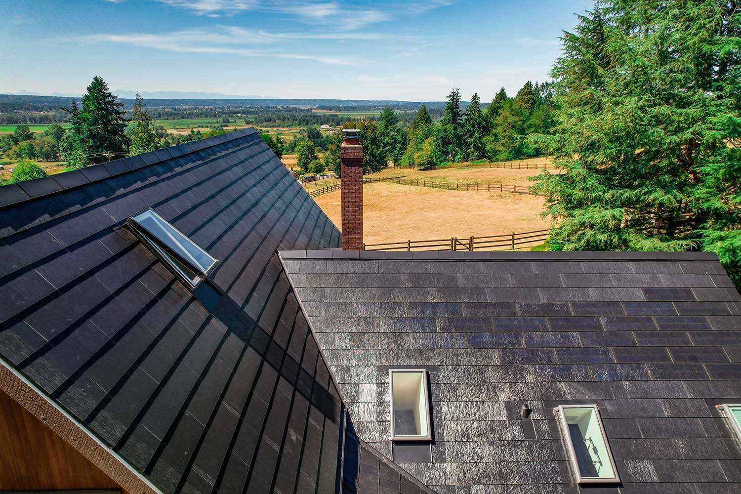 Multiple skylights with scenic view from the top of a Tesla Solar Roof in Washington