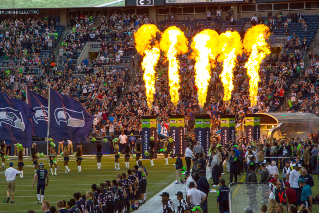 2014 Seahawks vs Bears game at Lumen Field with fire torch display.