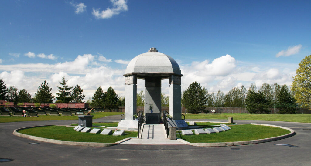 Circular domed open air architectural stone memorial structure, Jimi Hendrix Memorial, Greenwood Memorial Park Cemetary, Renton, WA