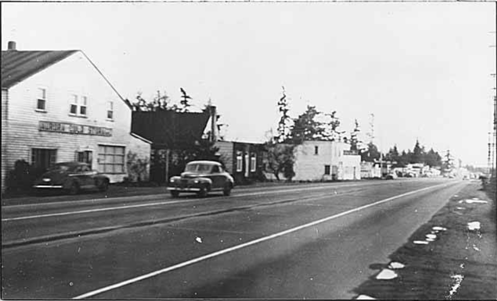 1948 Shoreline, CA, Aurora Avenue North with a view of Brayton's Cold Storage, Graney's Shoe Repair, and Cox's Garage.