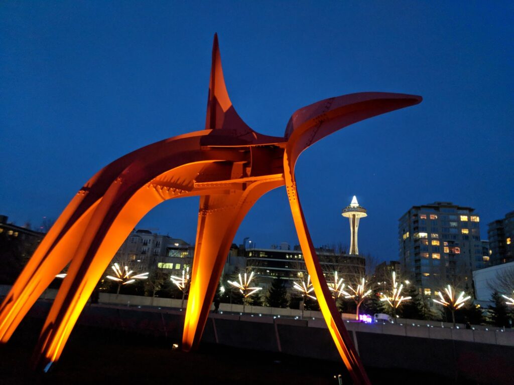 Olympic Sculpture Park at nighttime with illuminated view of Alexander Calder's sculpture "Eagle".