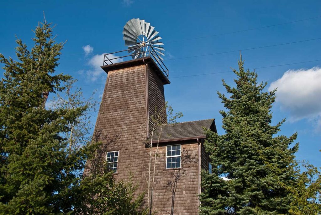 Edgewood, Washington, USA - April 23, 2011: The historic Nyholm Market and Windmill, built in 1902, greets visitors to the town
