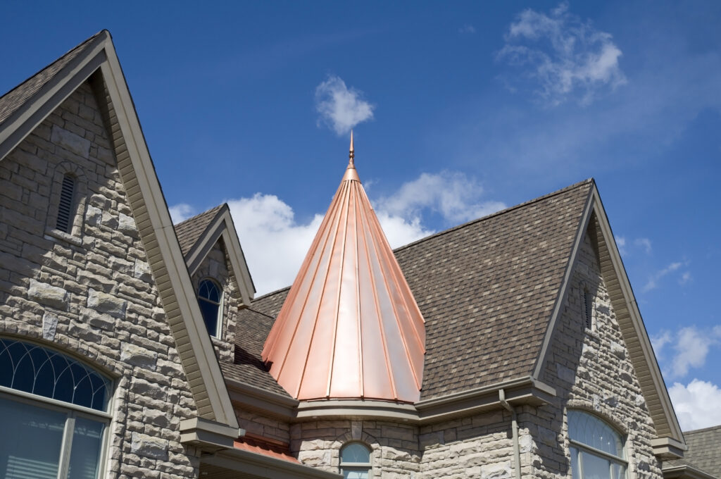 Copper roof on spire.