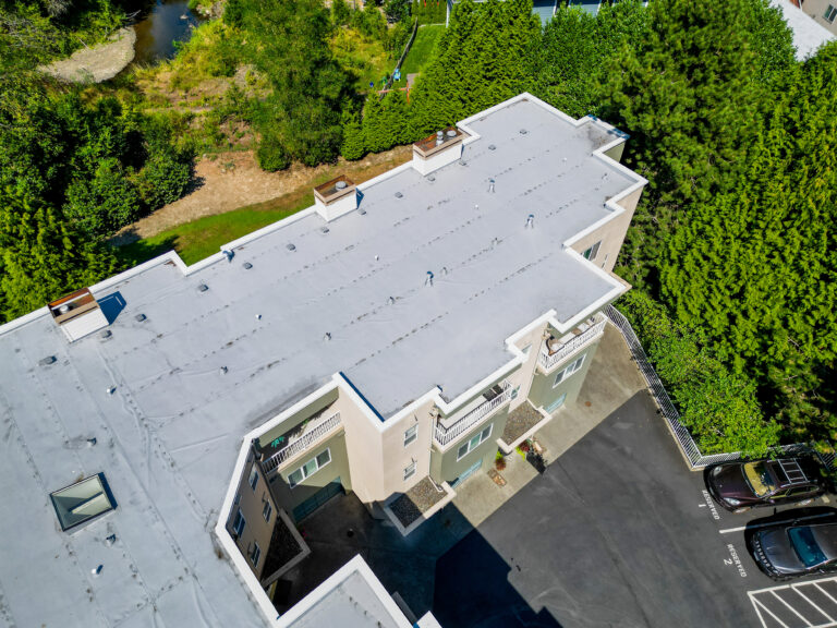 New Commercial Condominium Flat TPO Roof in Issaquah, Washington - Close up view of roof