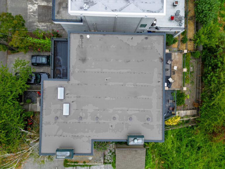 Two New Flat TPO Roof Replacements in Seattle, Washington - Overhead view of new roof