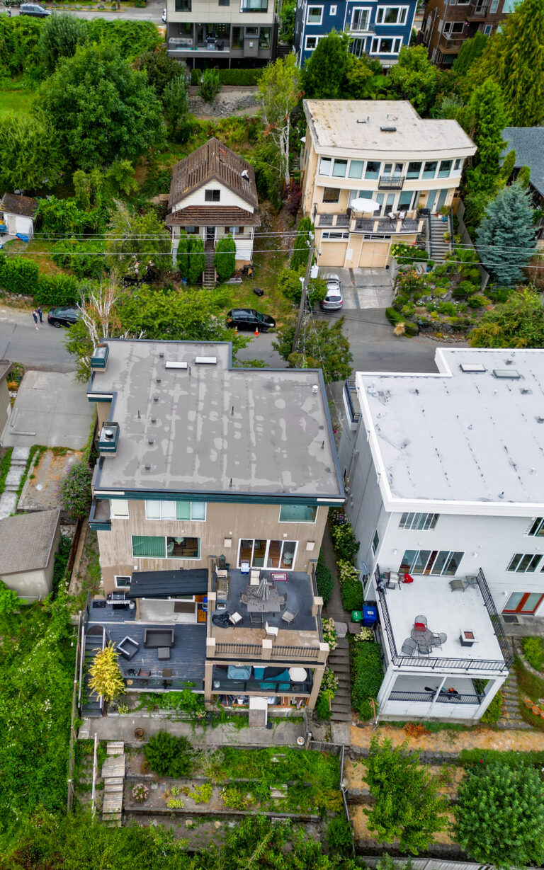 Two New Flat TPO Roof Replacements in Seattle, Washington - Close up view of new roof