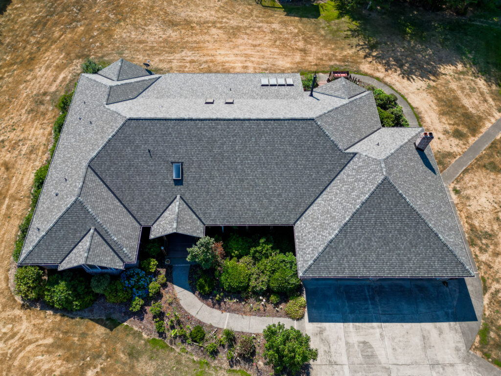 Home and Shop New Composite Shingles Roof in Kent, Washington - Overhead view of new home roof