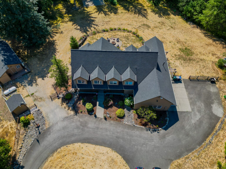 Multi-structure Residential Composite Shingles Roof in Ravensdale, Washington - Front of home
