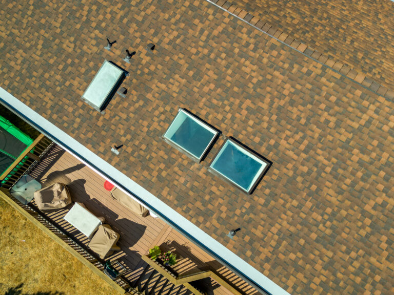 Residential Composite Shingles Roof in Newcastle, Washington - Close up view of new skylights