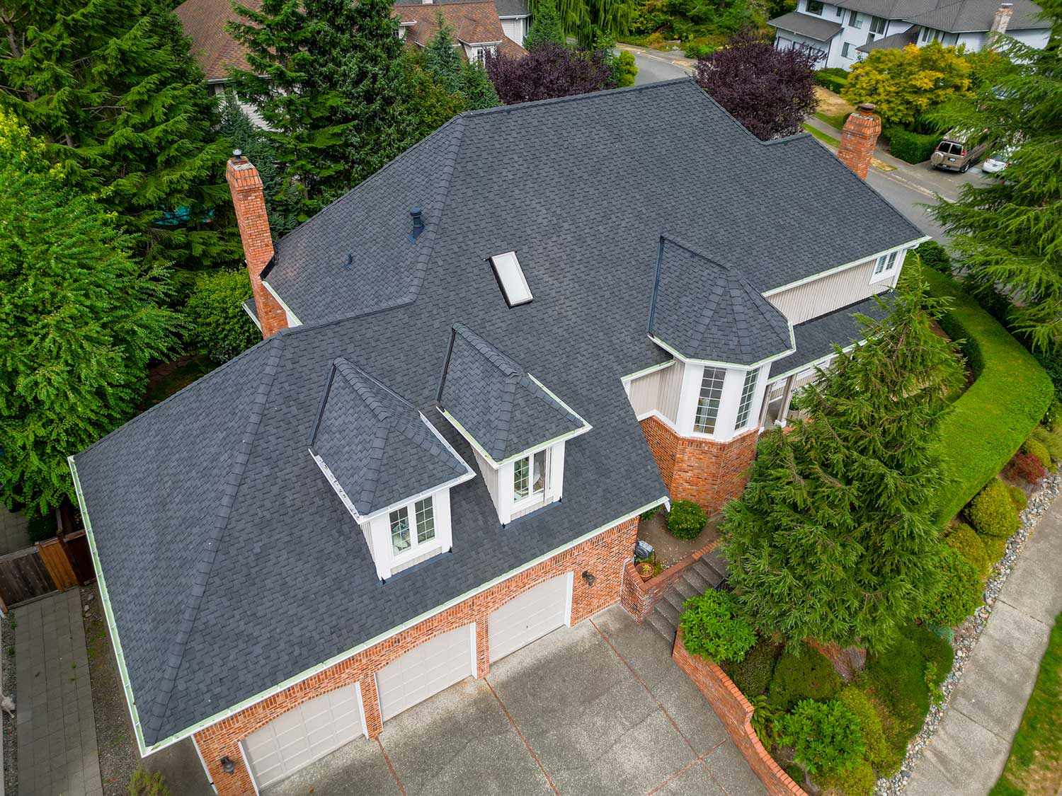 New Composite Asphalt Shingle Roof, Bellevue, Washington - overhead view view of front of house from angle