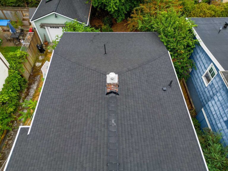 New Composite Asphalt Shingle Roof, Seattle, Washington - close up view of the chimney