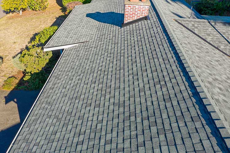 Composite Asphalt Shingles in Federal Way, Washington - close up of roof and chimney