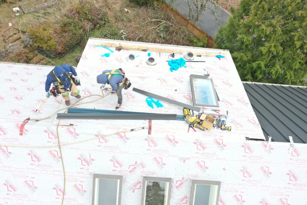 Roofers installing a new roof