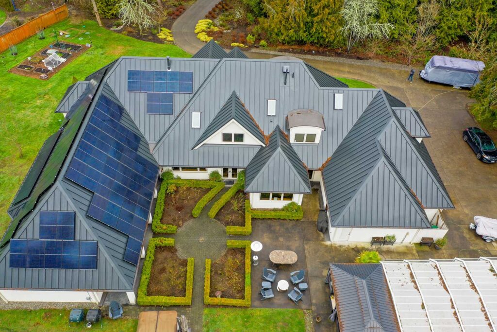 Amazing Metal Roof Installation with Solar in Redmond, Washington - view of back of roof