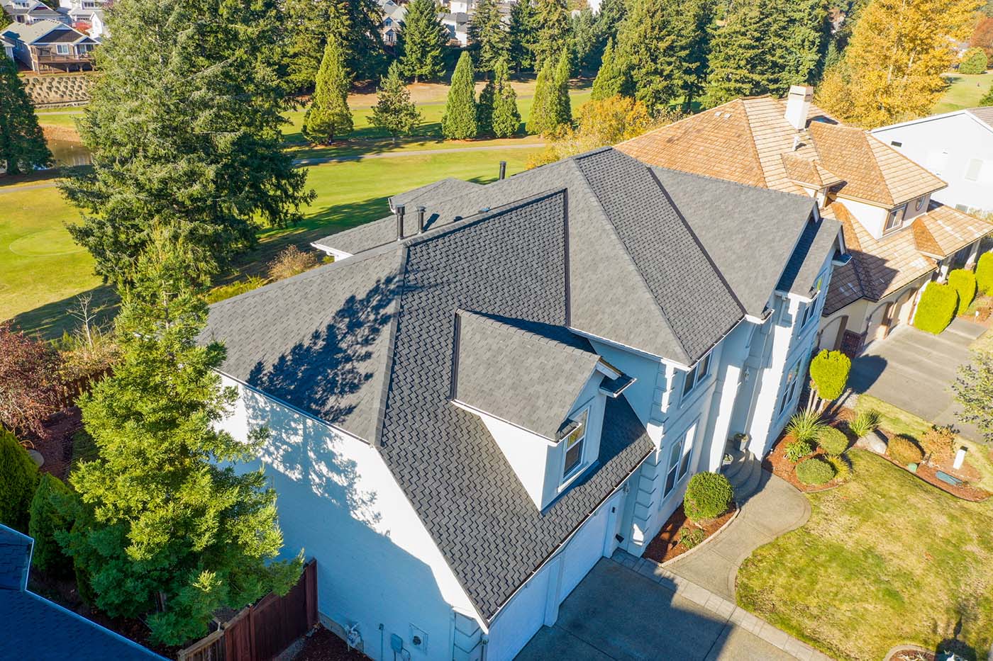 New Composite Asphalt Shingle Roof with Stucco in Tacoma, Washington - view of roof from an angle