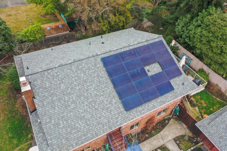 New Composite Asphalt Shingle Roof in Burien, Washington - view of new roof with solar panels