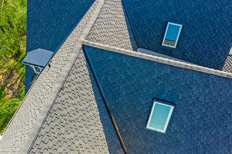 New Composite Asphalt Shingles Roof in Tacoma, Washington: close up view of roof skylights and other details