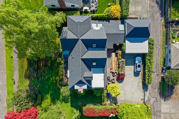 New Composite Asphalt Shingles Roof in Tacoma, Washington: View of top of house and roof