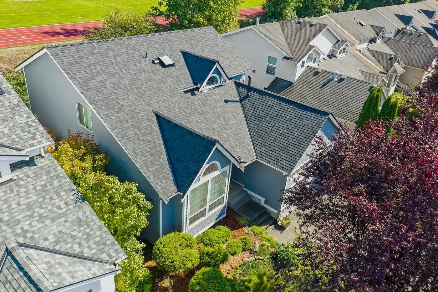 Composite Asphalt Shingle in Renton, Washington: overhead view of new roof and front of house