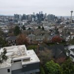 Flying High: A Stunning View of Seattle During a Roof Replacement Estimate