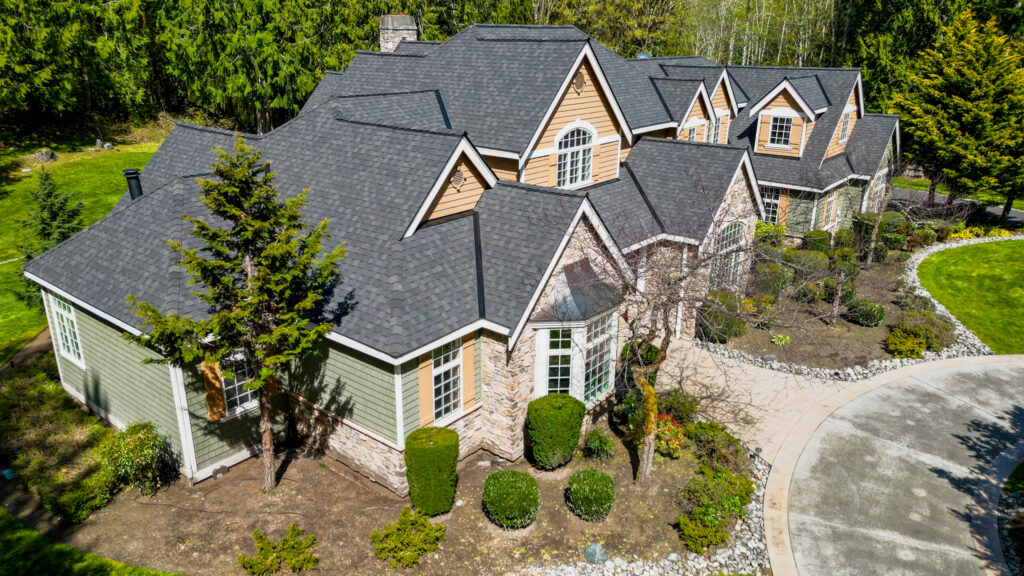 View of Home with Composite Asphalt Shingle Roof in Issaquah, Washington