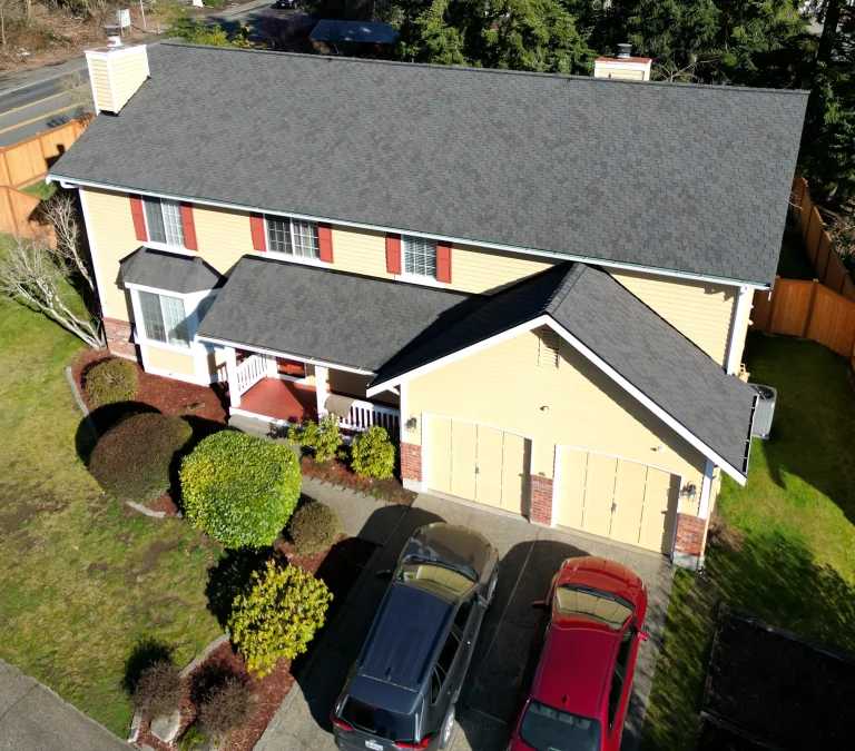 Aerial view from the front of the house featuring the new CertainTeed composite asphalt shingle roof in Auburn, Washington.