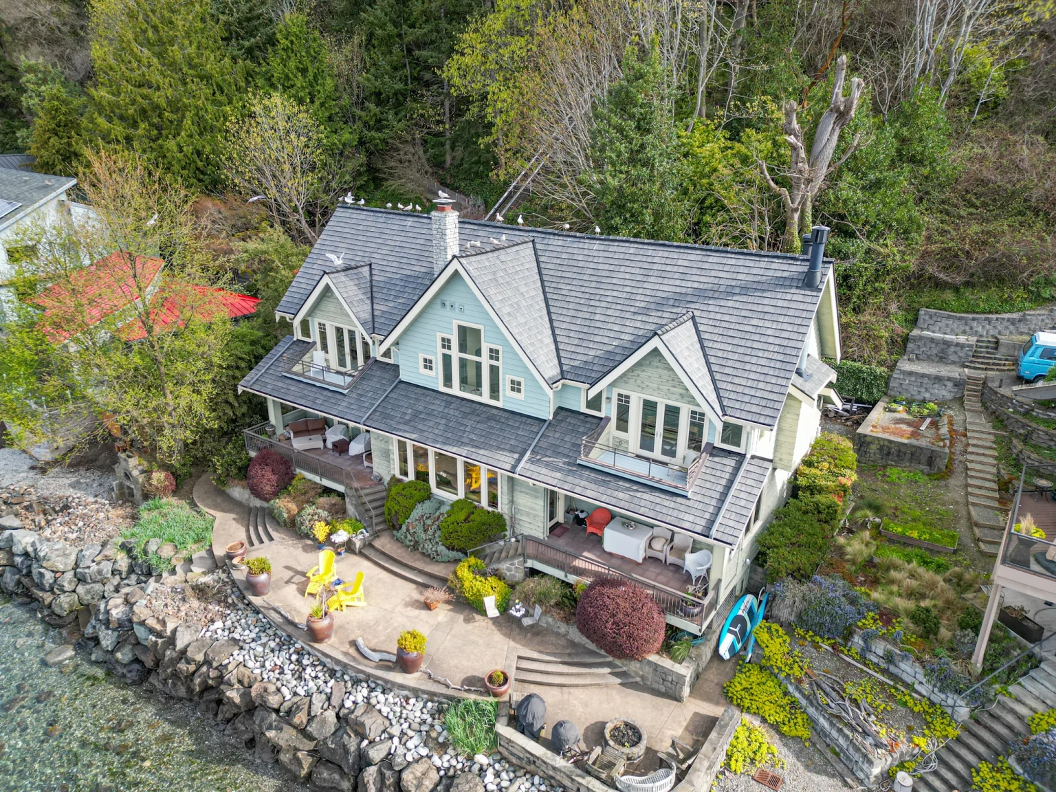 Zoomed out view of front of house with a new Synthetic Cedar Shake Roof in Burien, Washington