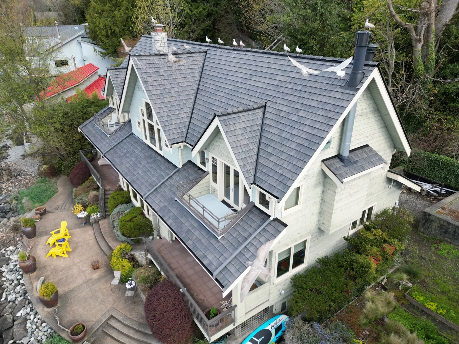 Close up view of house with a new Synthetic Cedar Shake Roof in Burien, Washington