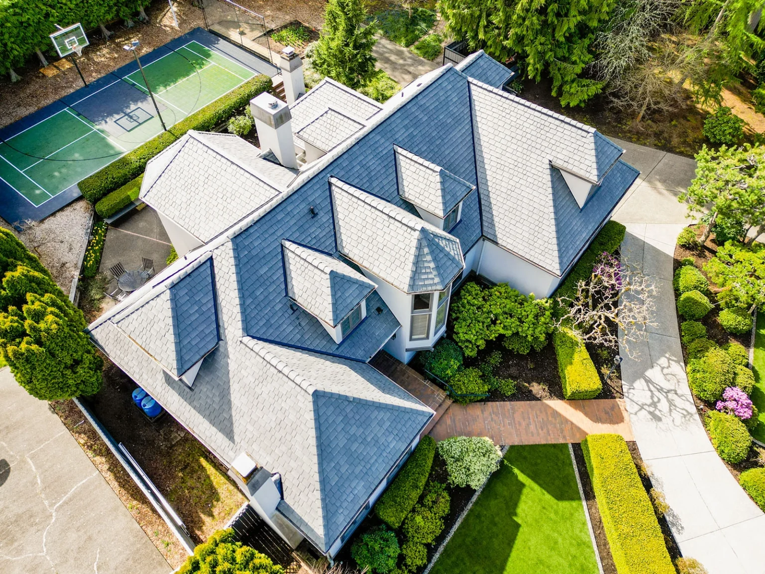 Overhead view from an angle of house and backyard with a Synthetic Slate Roof in Shoreline, Washington