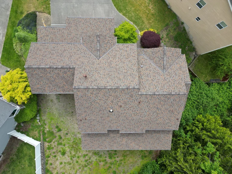 Overhead view from the top of a house with a New Roof Installation Composite Asphalt Shingle in Covington, Washington