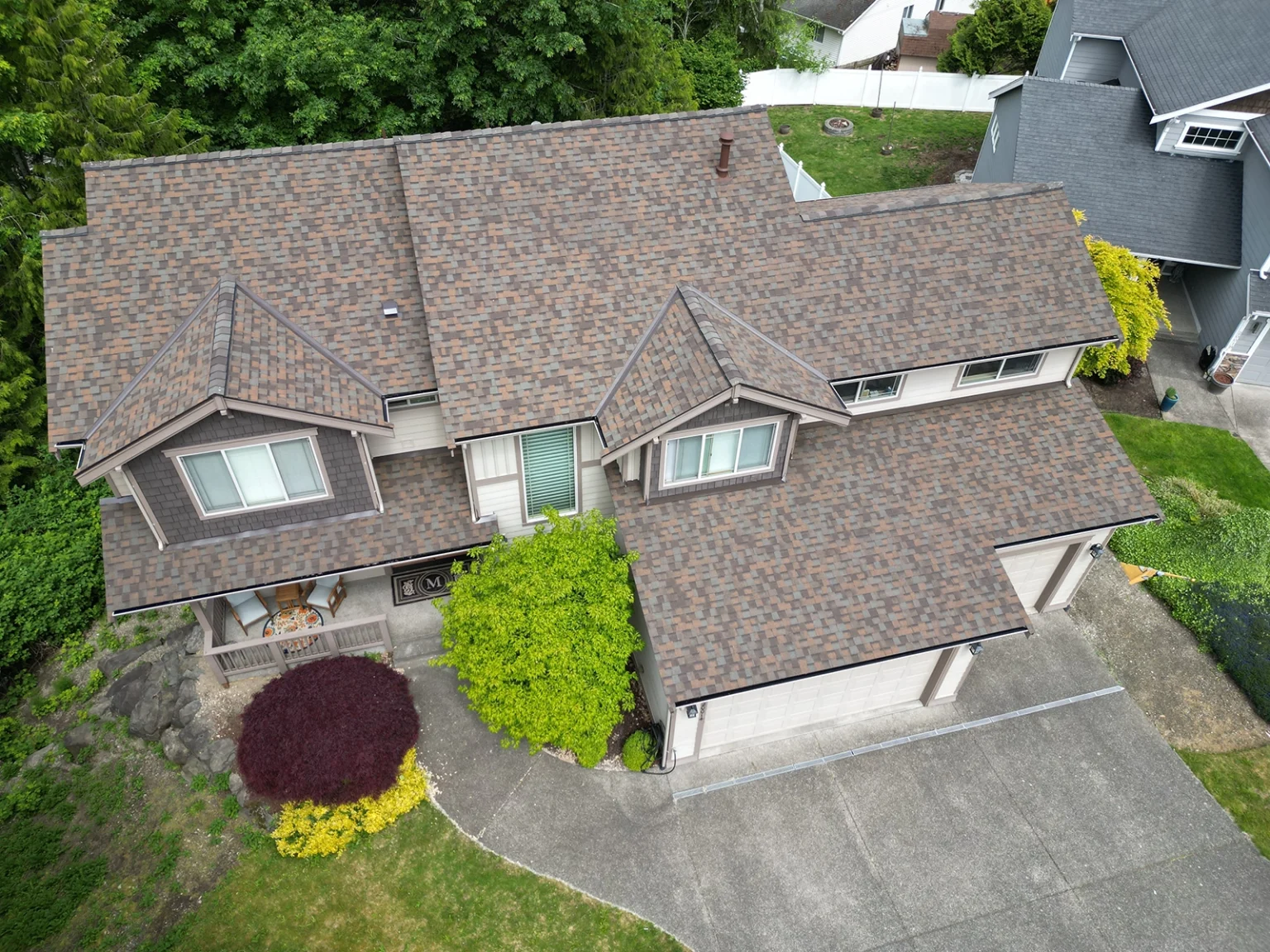 Overhead view of the front of a house with a New Roof Installation Composite Asphalt Shingle in Covington, Washington