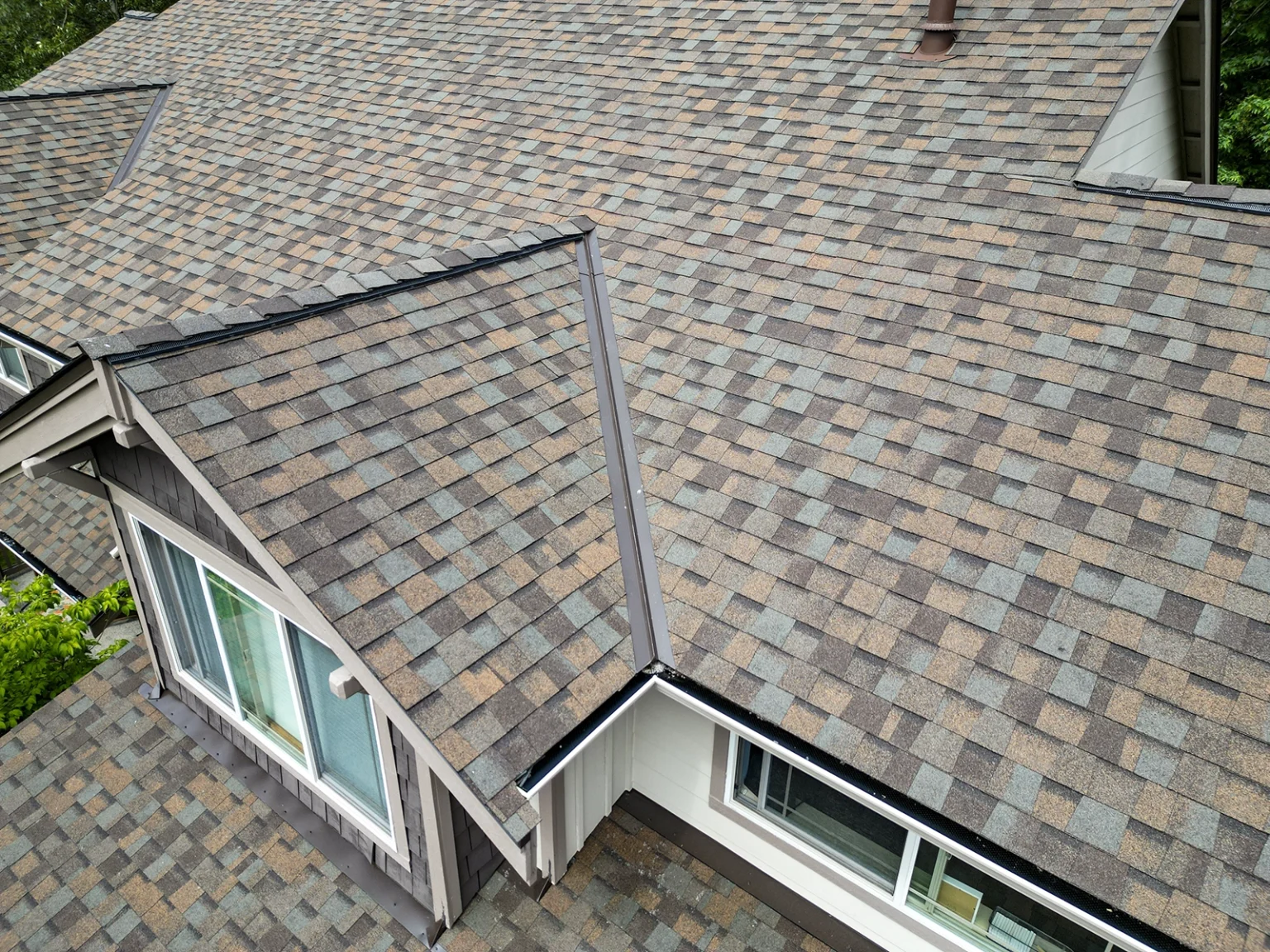 Close up view of shingles on a New Roof Installation Composite Asphalt Shingle in Covington, Washington