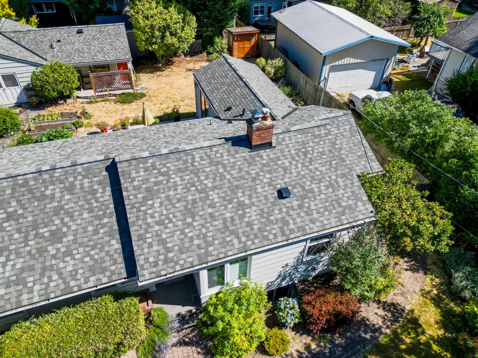 Close up overhead view of Composite Asphalt Shingle Roof Replacement in Seattle, Washington