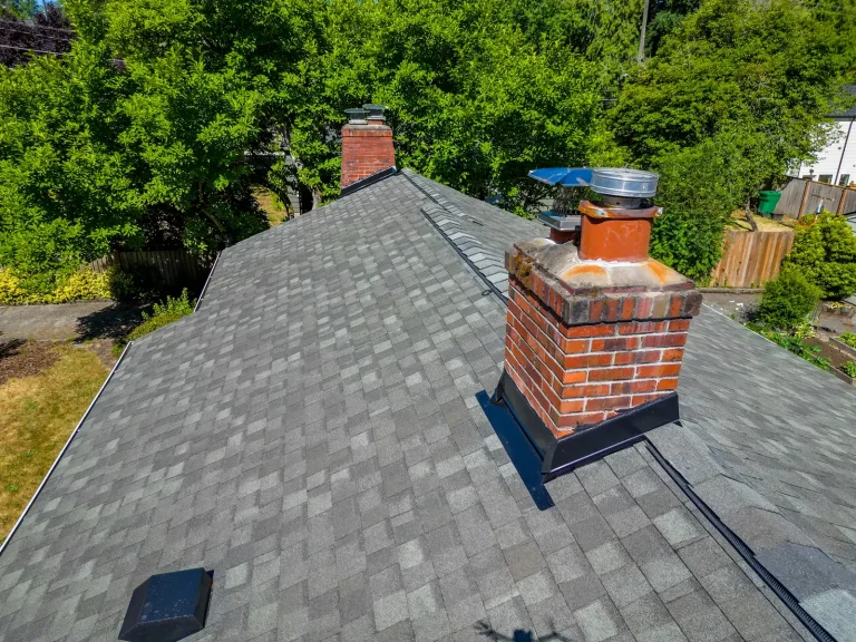 Close up view of chimneys of a Composite Asphalt Shingle Roof Replacement in Seattle, Washington