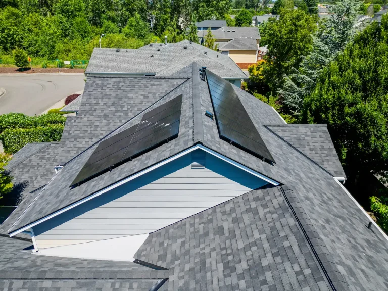 Close up view of Composite Asphalt Shingles with Existing Solar in Renton, Washington