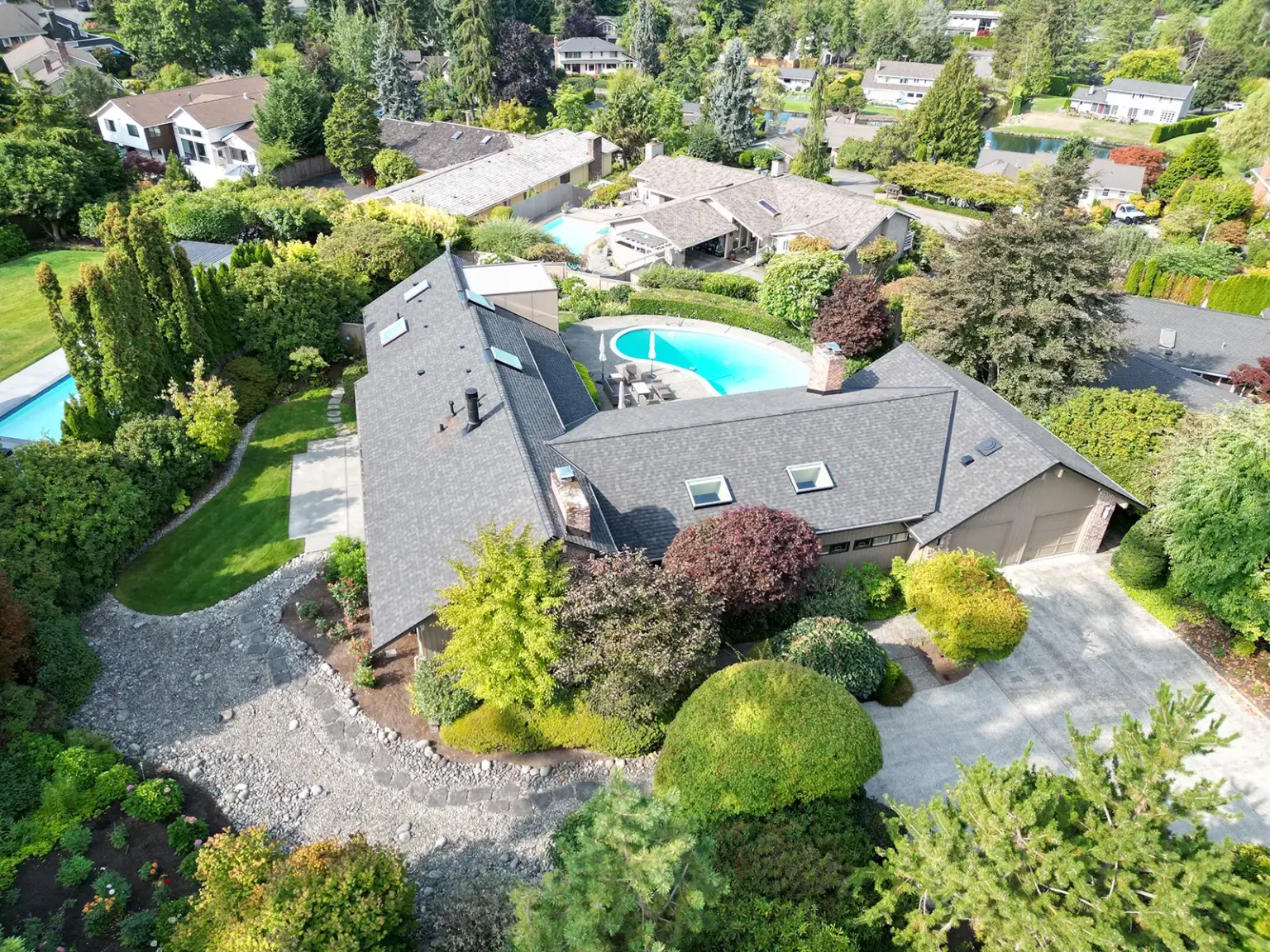 Overhead view from an angle of a Composite Roof with Flat section in Clyde Hill, Washington.