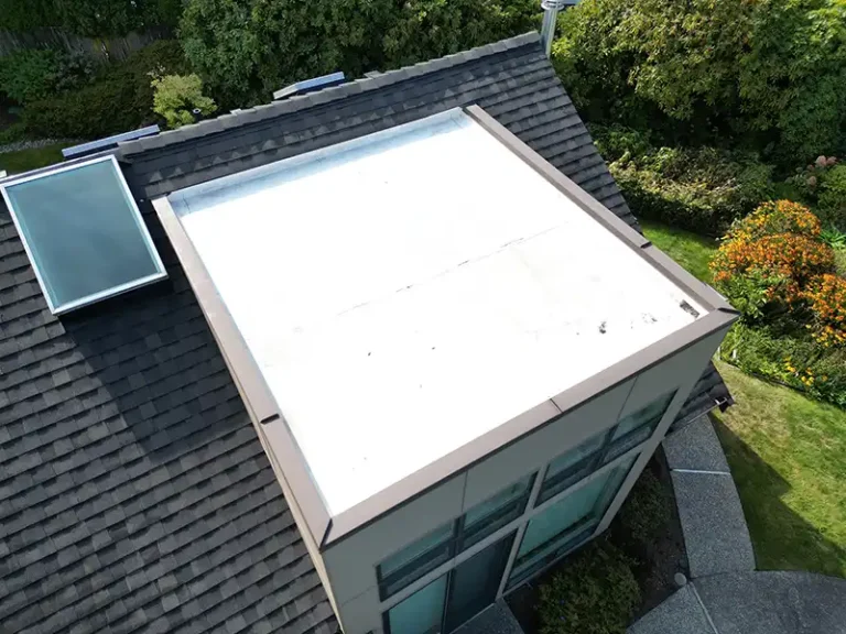 Close up view of a flat roof section of a Composite Roof with Flat section in Clyde Hill, Washington.