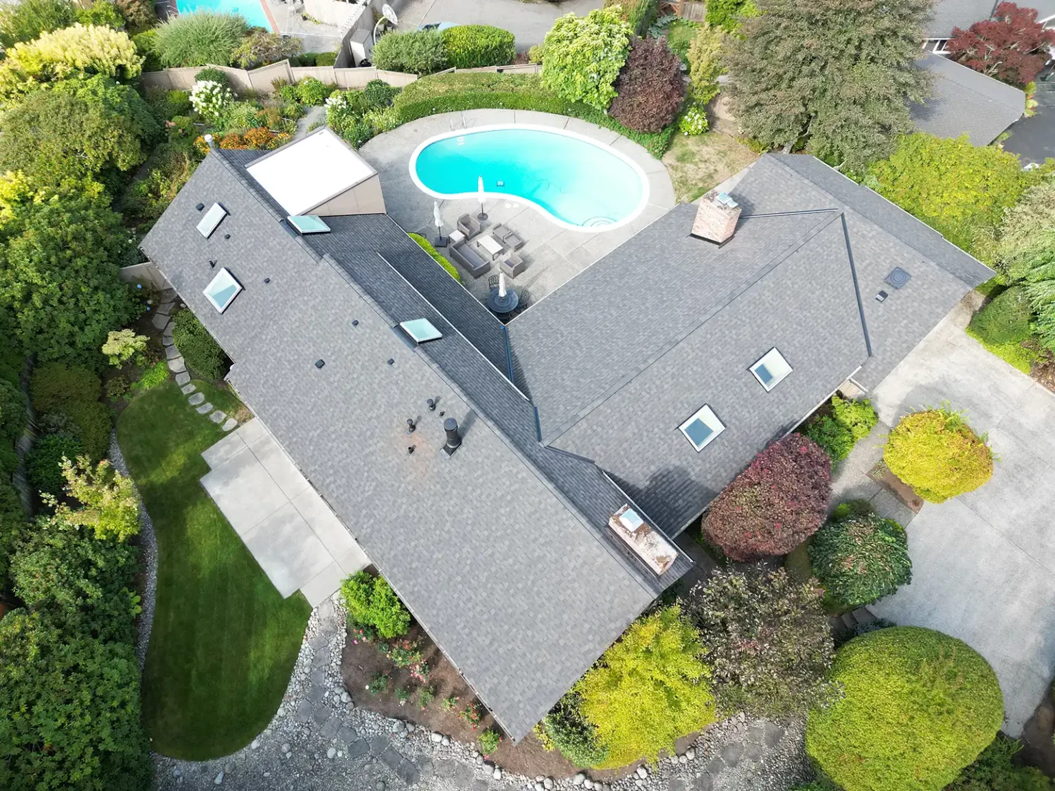 Overhead view from an angle of a Composite Roof with Flat section in Clyde Hill, Washington.