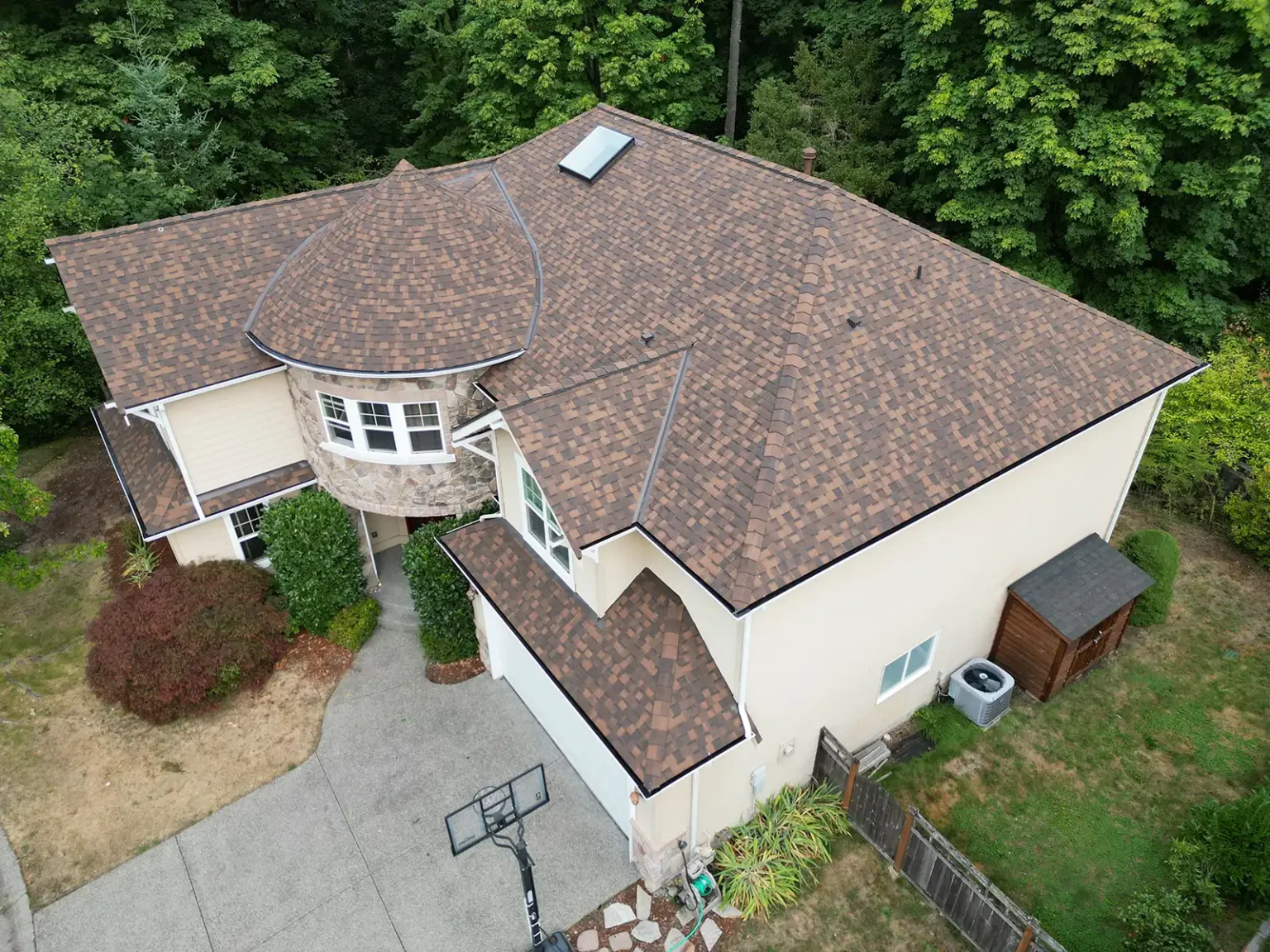Overhead view from an angle of a New Composite Roof for Castle in Renton, Washington