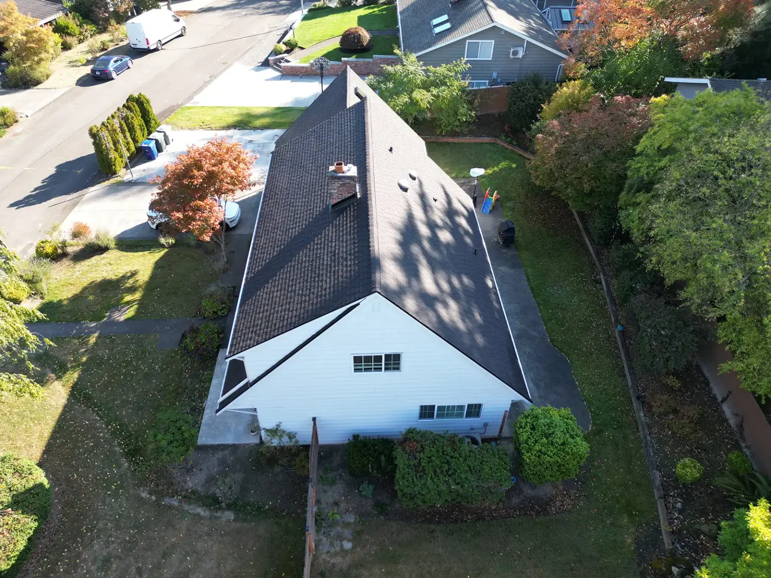 Overhead view from an angle of the side of a New Composite Roof in Bellevue, Washington